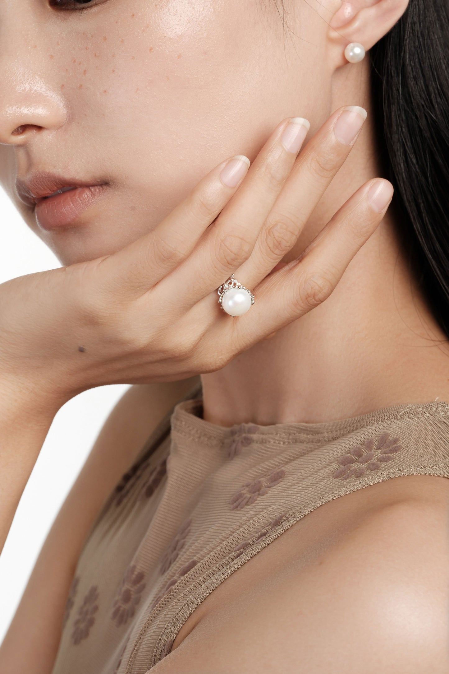 Carved silver pearl ring